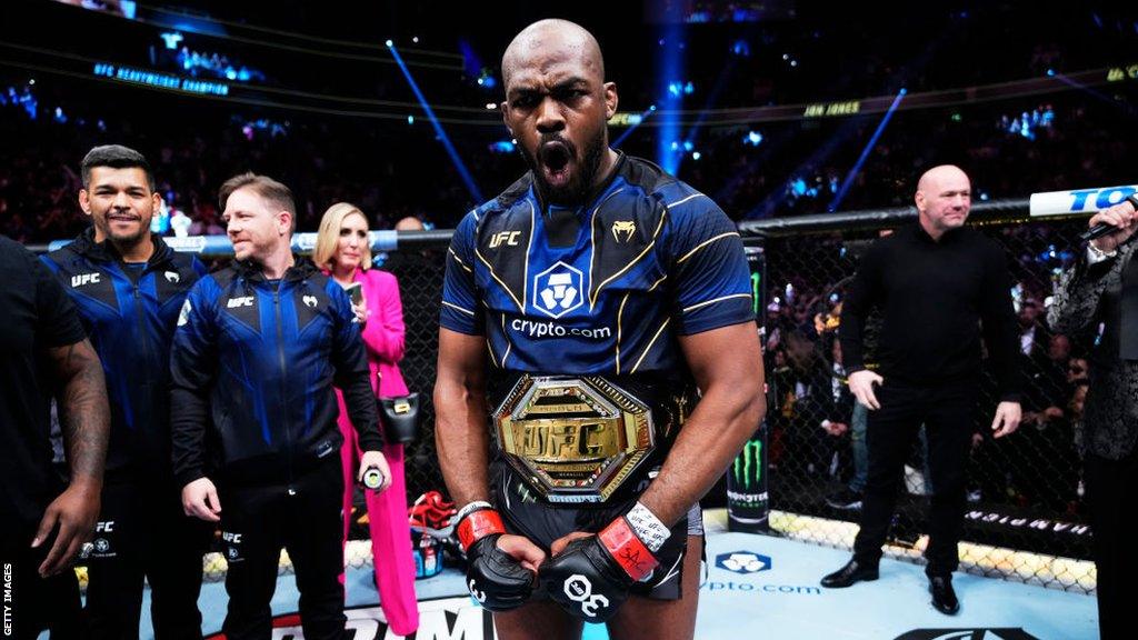 Jon Jones celebrates beating Ciryl Gane in March