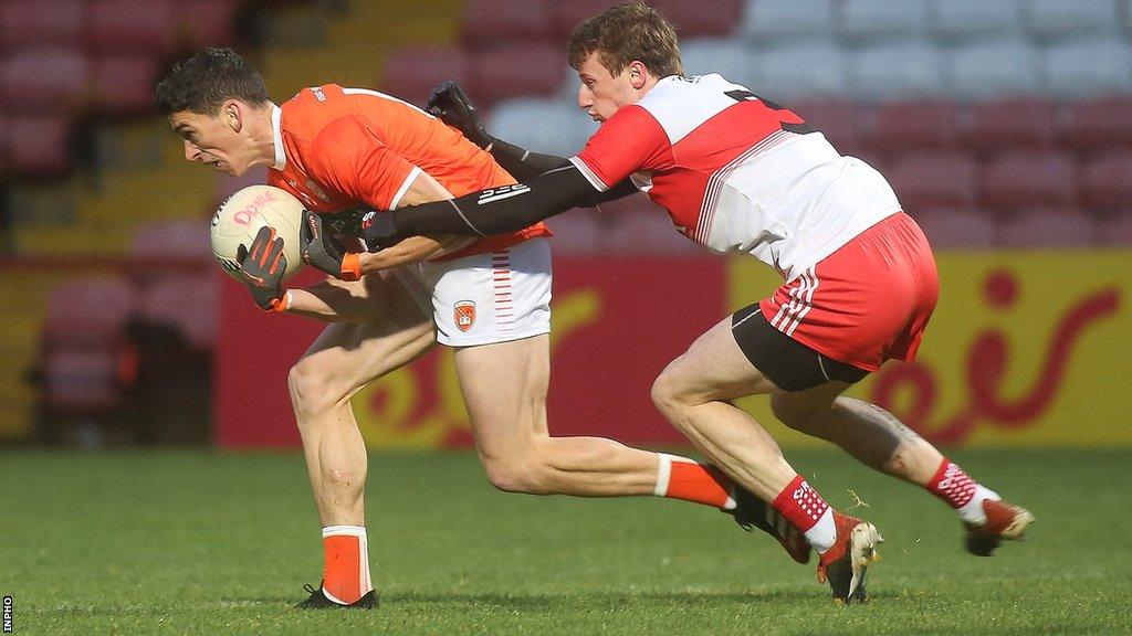 Derry's Brendan Rogers tackles Armagh's Rory Grugan in the November 2020 Ulster SFC contest at Celtic Park