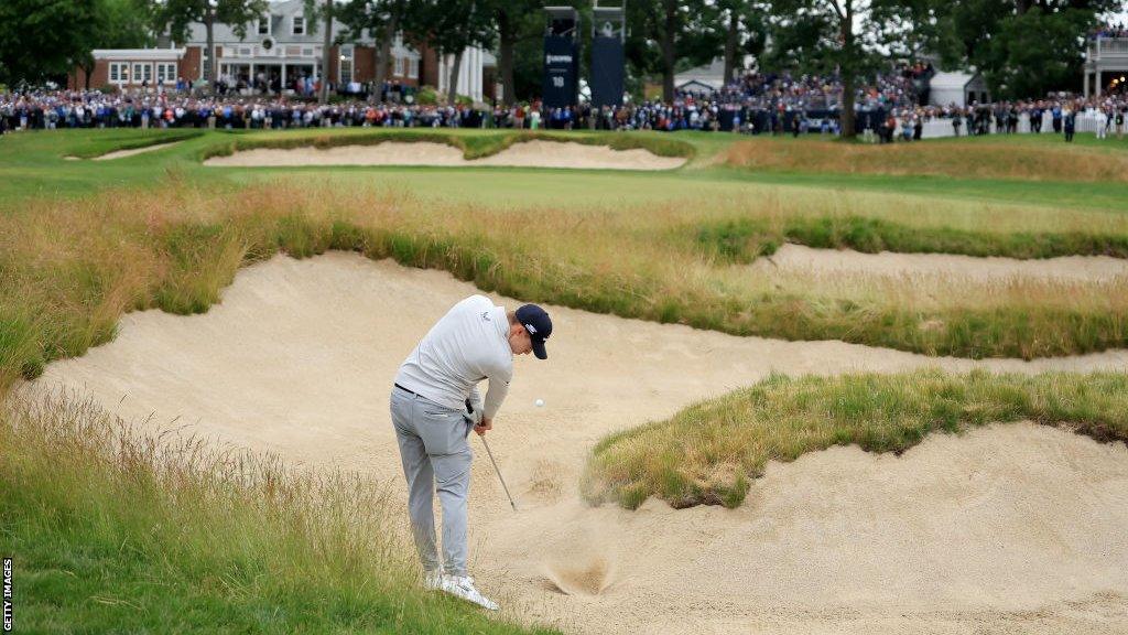 England's Matt Fitzpatrick plays a shot from a bunker on the 18th hole at Brookline in the final round of the 2022 US Open