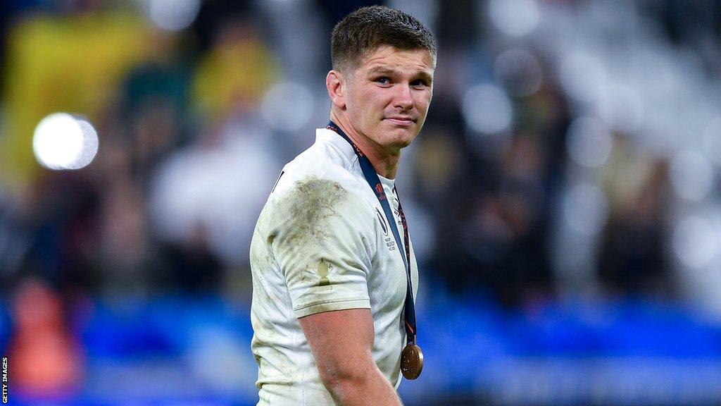 Owen Farrell of England looks on after being awarded his bronze medal at the Rugby World Cup