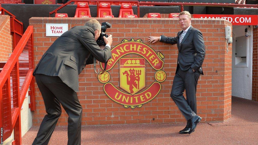 David Moyes poses for photographs at his unveiling at Old Trafford