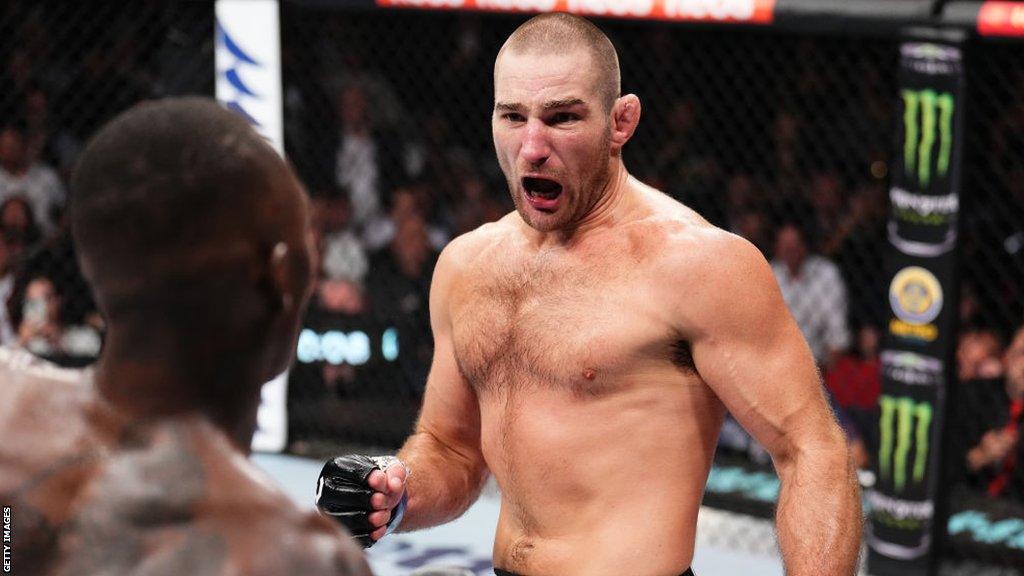 Sean Strickland in action against Israel Adesanya at UFC 293 in Sydney, Australia