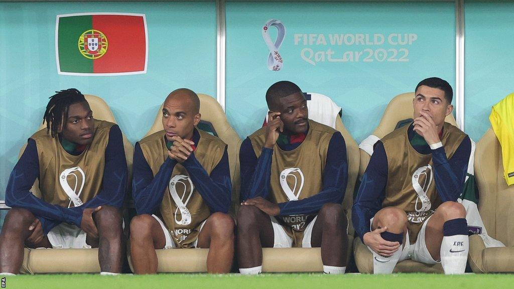 Cristiano Ronaldo sits on the bench against Morocco