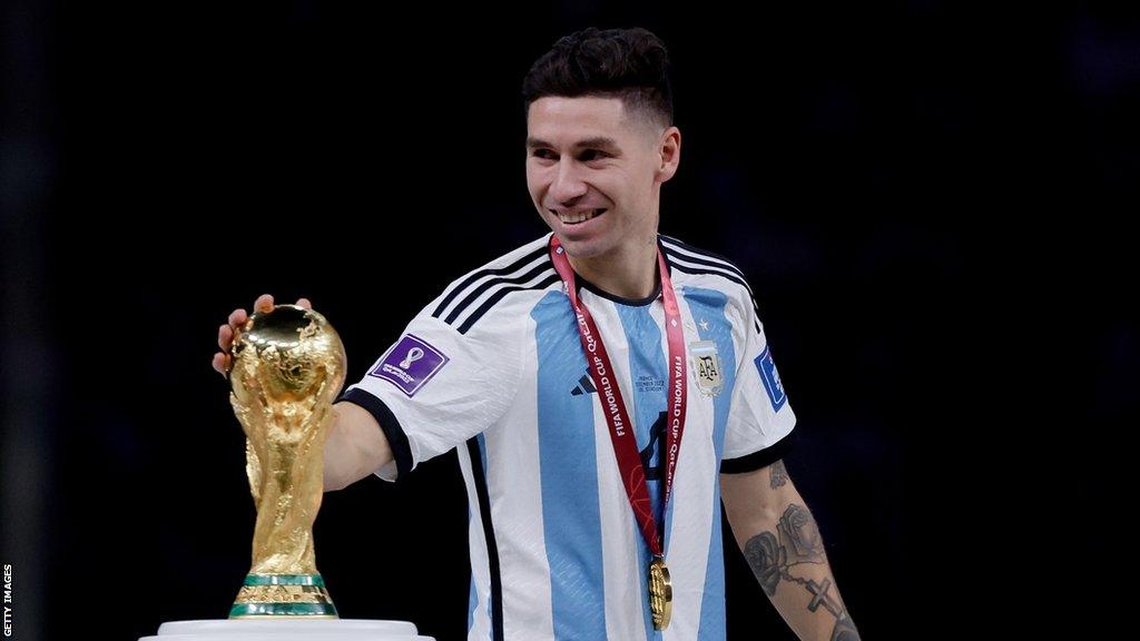 Gonzalo Montiel with the World Cup trophy