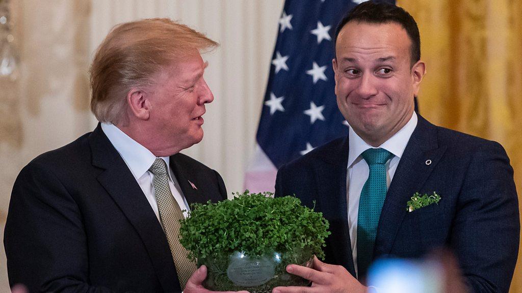 Donald Trump and Leo Varadkar holding a bowl of shamrock