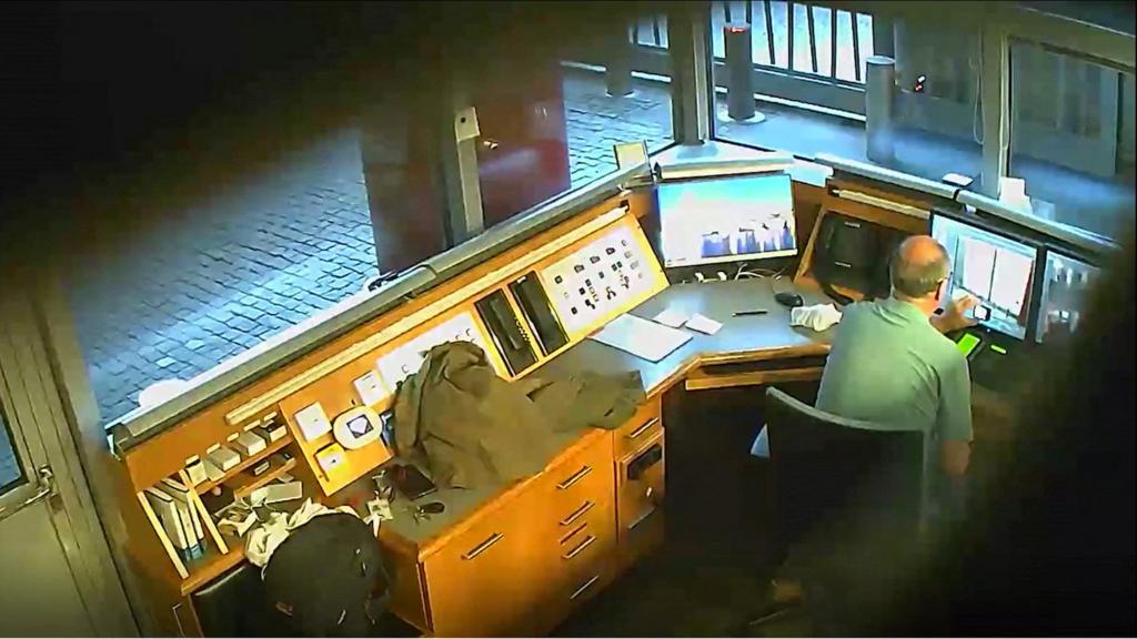 David Smith monitors the security kiosk at the British embassy in Berlin