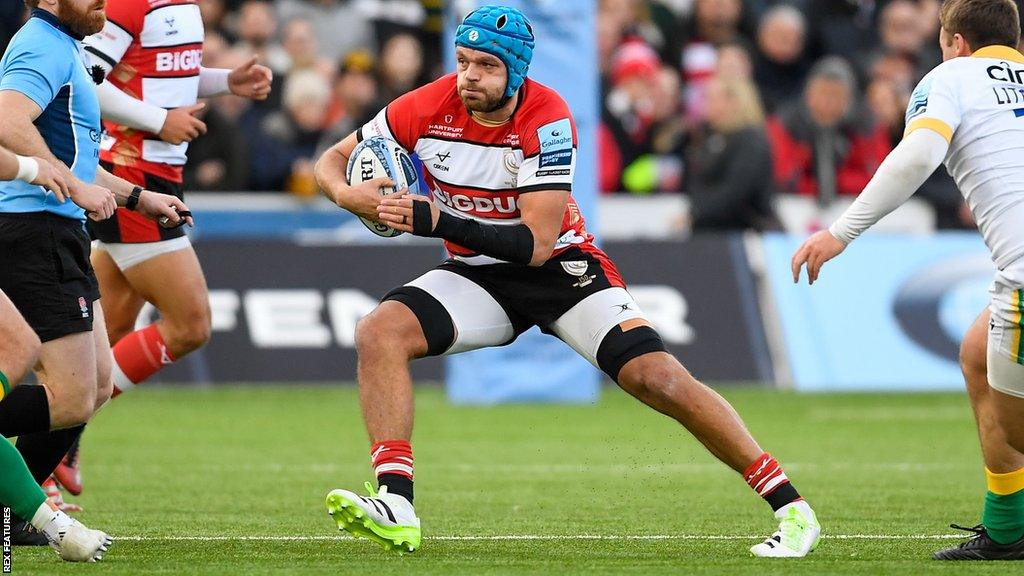 Zach Mercer with the ball during a game for Gloucester