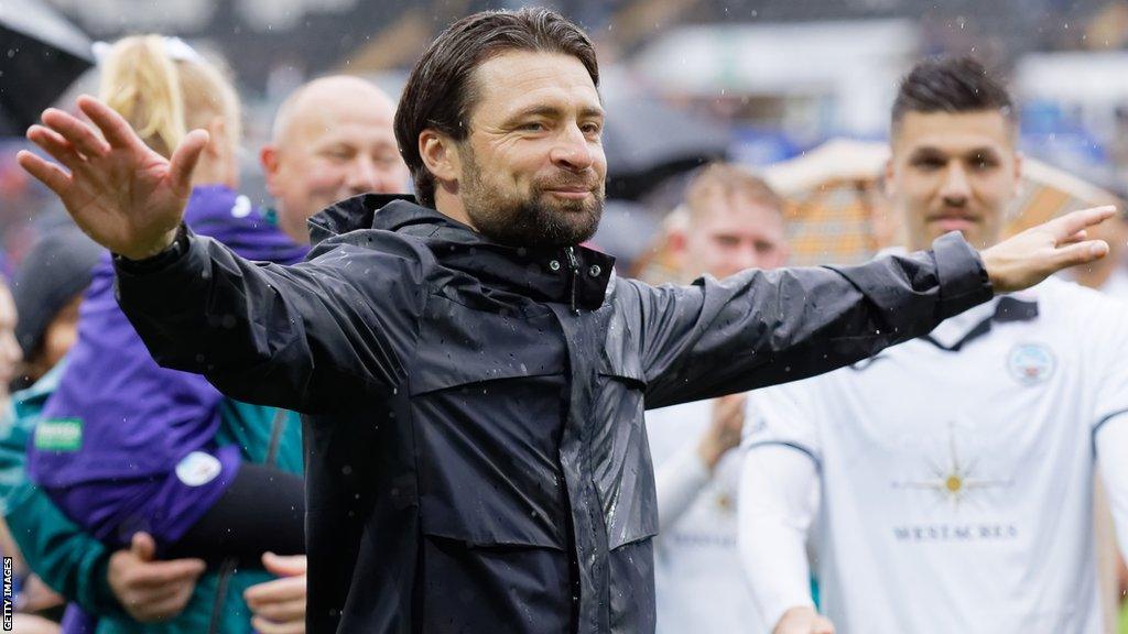 Russell Martin celebrates with Swansea fans after their win over West Brom on the last day of the 2022-23 campaign