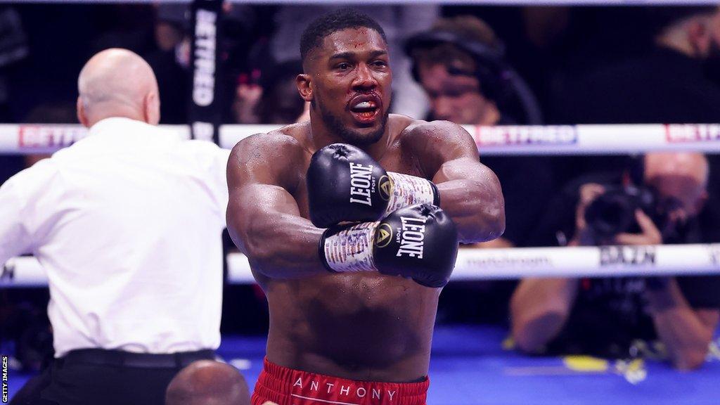 Anthony Joshua celebrates