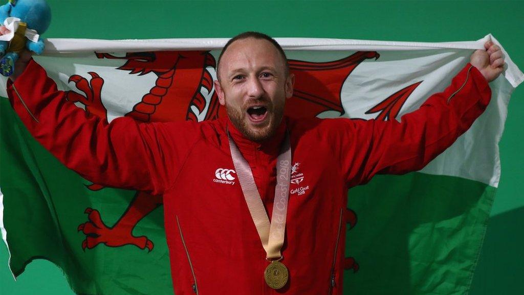 Gareth Evans with the Welsh flag