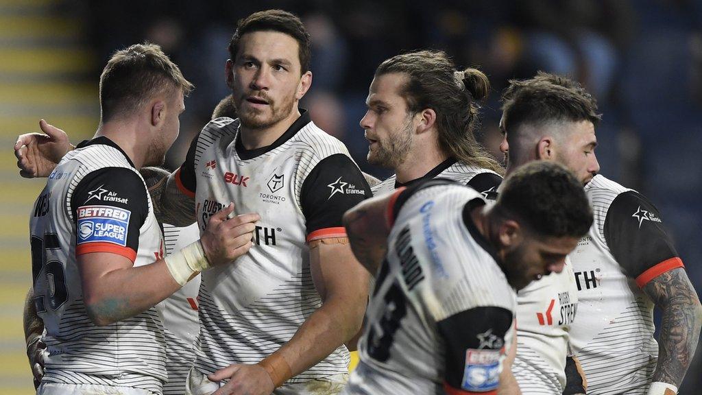 Toronto Wolfpack players celebrating a try