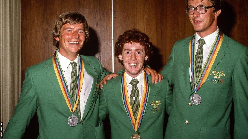 Hugh Russell (centre) and sailors David Wilkins (left) and Jamie Wilkinson (right) are photographed at Dublin Airport in 1980 after returning from the Moscow Olympics where they won medals