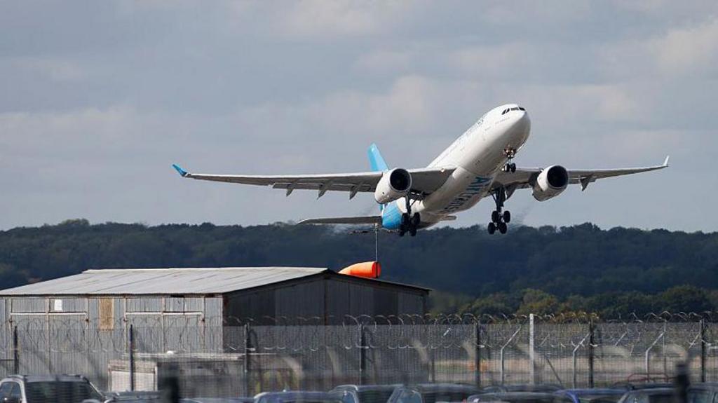 A plane taking flight from Gatwick Airport