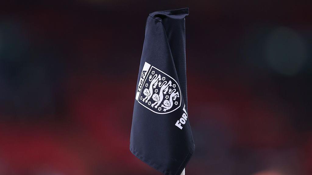 Generic shot of corner flag with England badge on