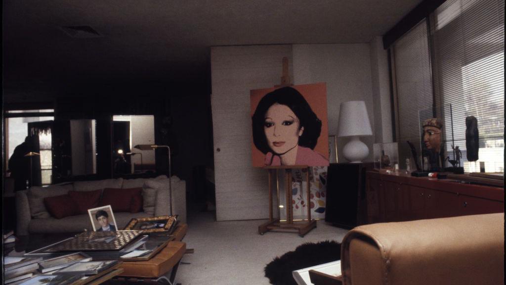 Andy Warhol's portrait of Farah Pahlavi in the library of her former residence at the Niavaran Palace, Tehran, 23rd December 1979. The palace complex is now a museum.