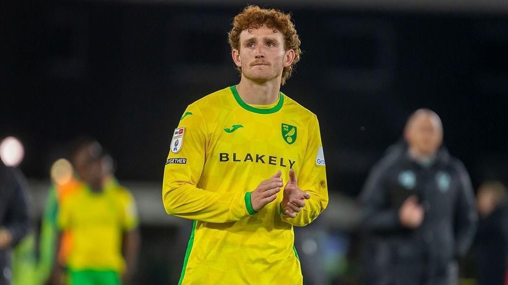 Josh Sargent applauds the Norwich fans 