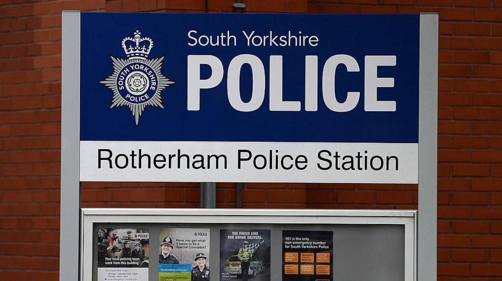 A photo of the entrance sign at Rotherham Police Station.