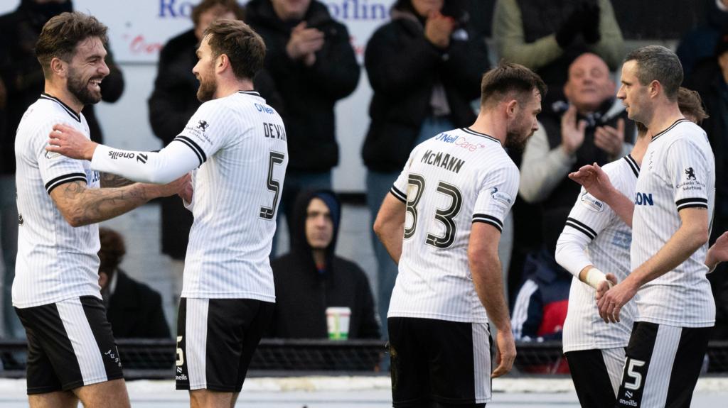 Ayr United players celebrating