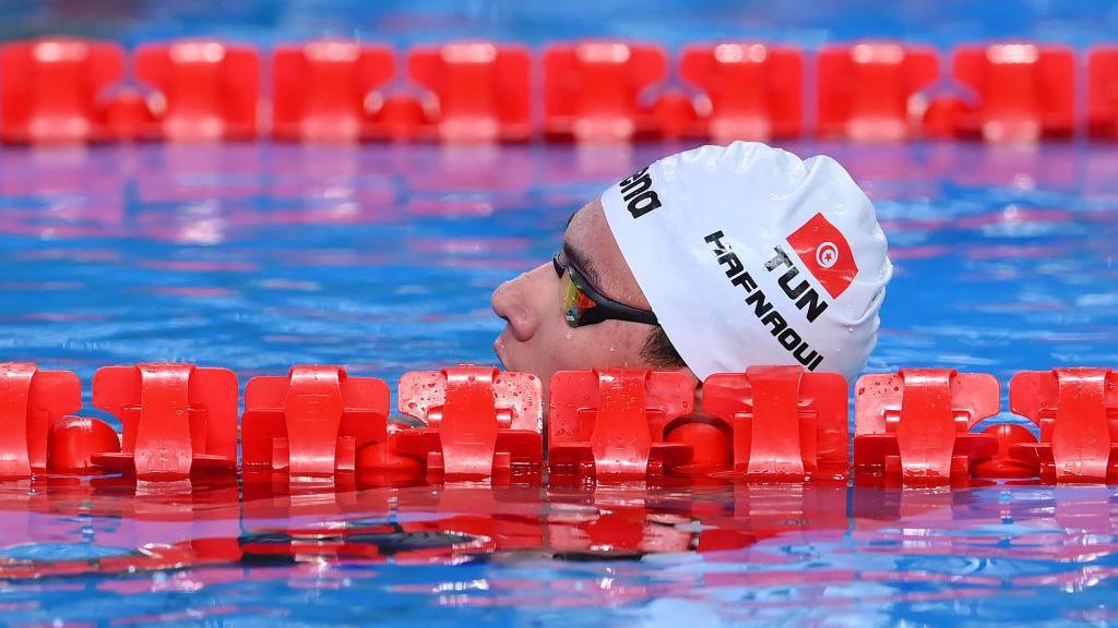 Ahmed Hafnaoui in the swimming pool