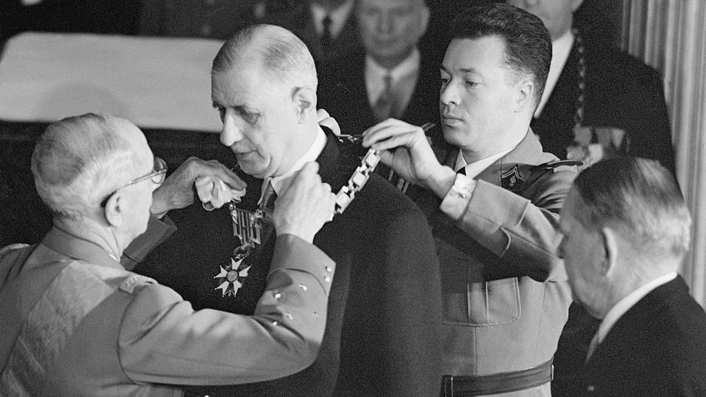 Gen. Charles De Gaulle (second from left) receives the Grand Collar of the Legion of Honor as he takes office as the first president of France's fifth republic