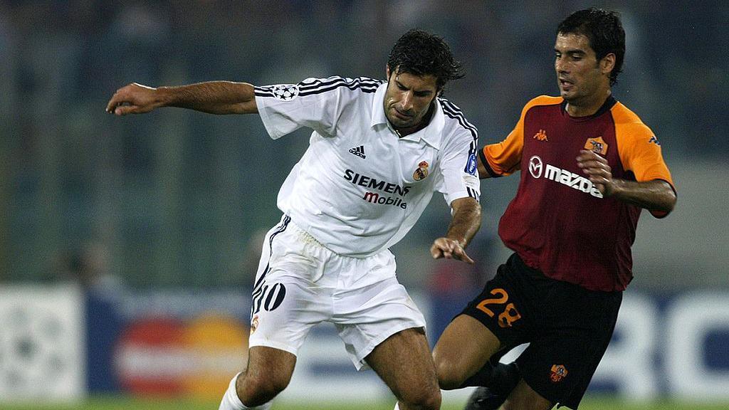 Luis Figo of Real Madrid and Pep Guardiola, during his Roma days, vying for the ball