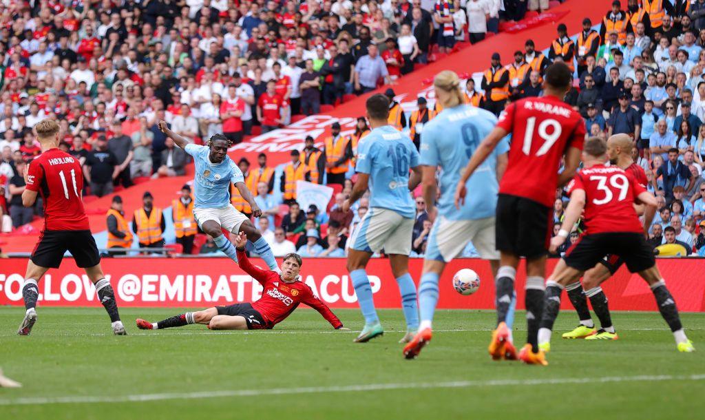 Jeremy Doku scores for Manchester City in the FA Cup final