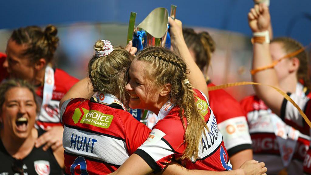 Natasha Hunt and Zoe Aldcroft celebrate winning the PWR title