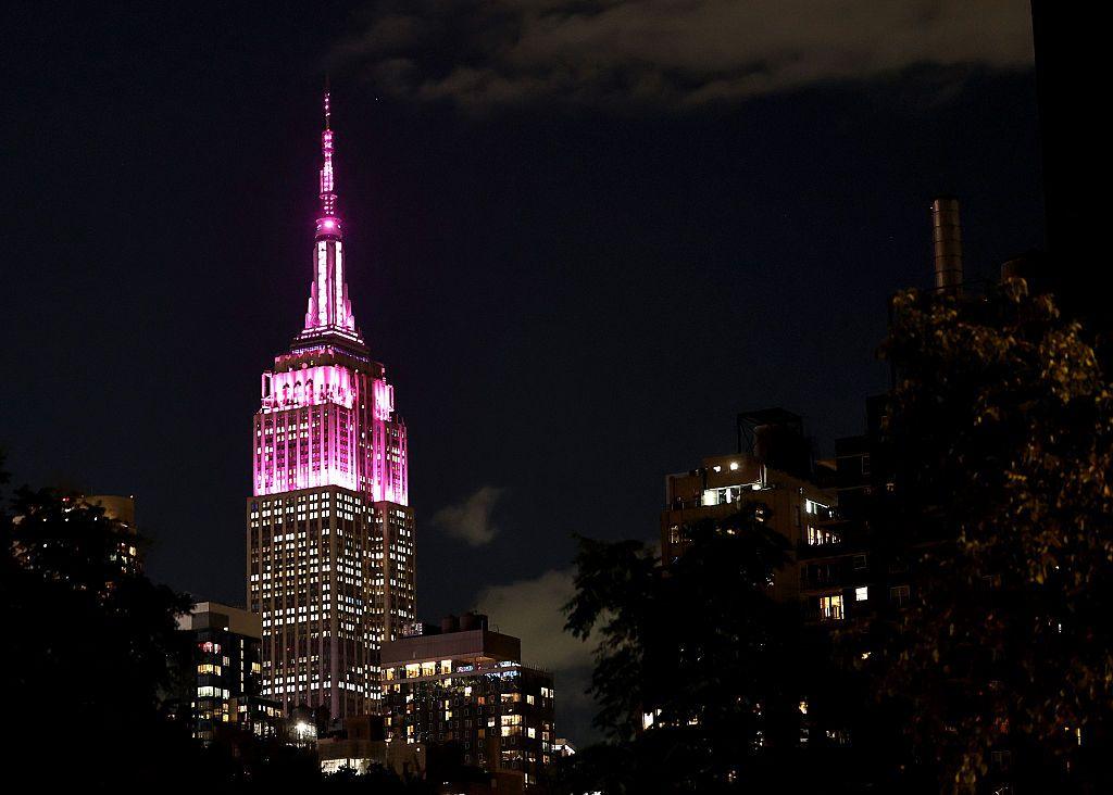 New York City's Empire State Building sparkles in pink.