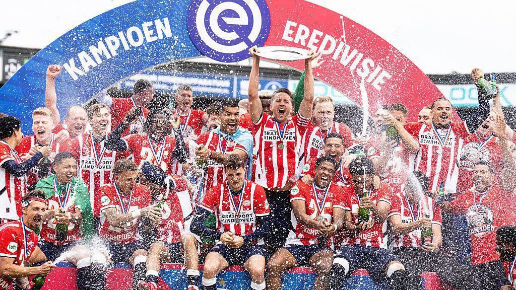 PSV Eindhoven players with the Eredivisie trophy