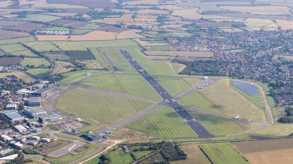 An aerial view of the runway at Cranfield Airport.