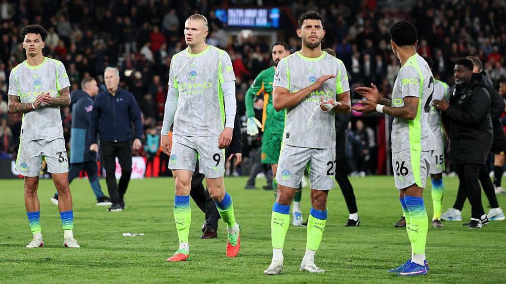 Man City players look dejected after draw with Bournemouth