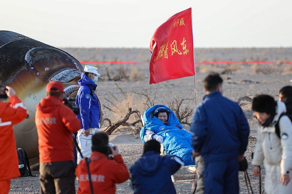 Crew member of Shenzhou-20 Wang Jie is seen after arriving at the landing site in the Gobi Desert.