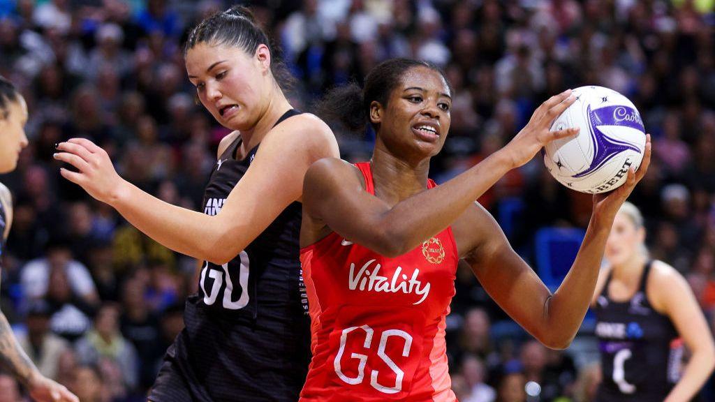 England's Liv Tchine pictured successful possession during nan Roses' 59-55 triumph against New Zealand