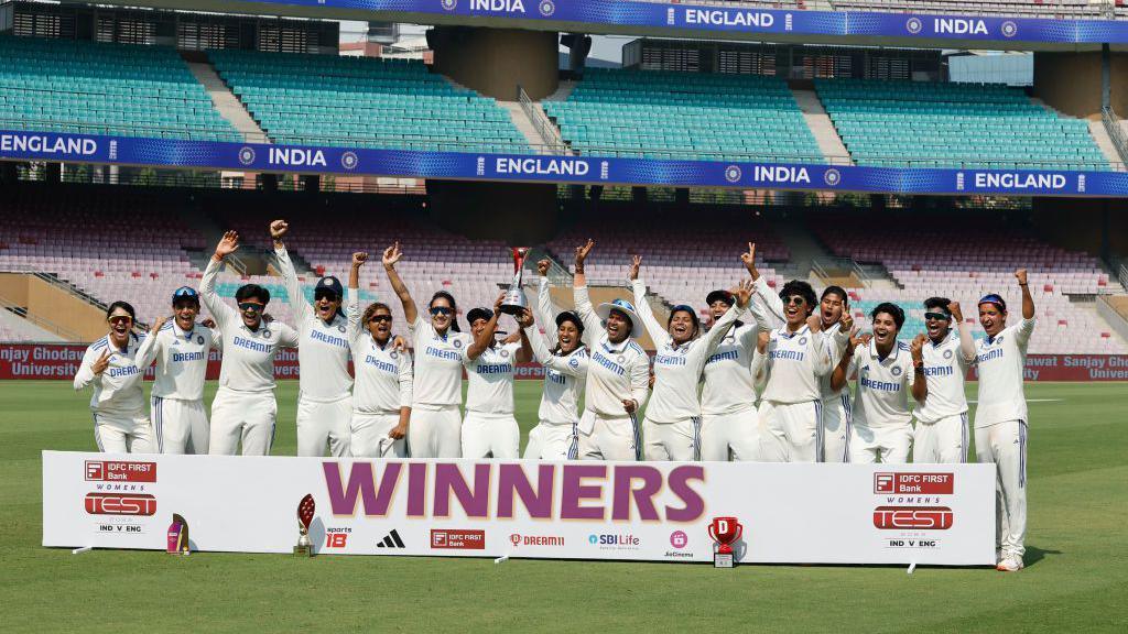 India Women celebrate beating England