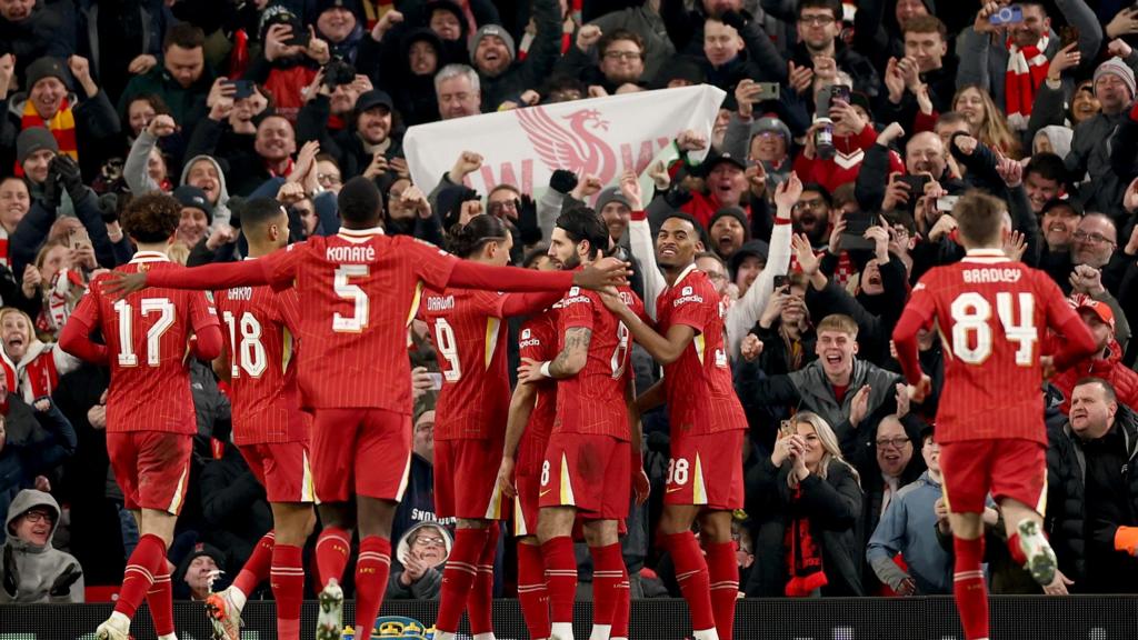 Liverpool celebrate as they thrash Tottenham