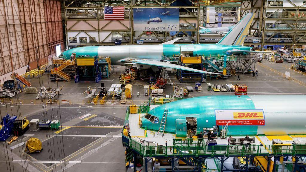 Boeing employees build 777 aircraft at a production facility in Everett, Washington.