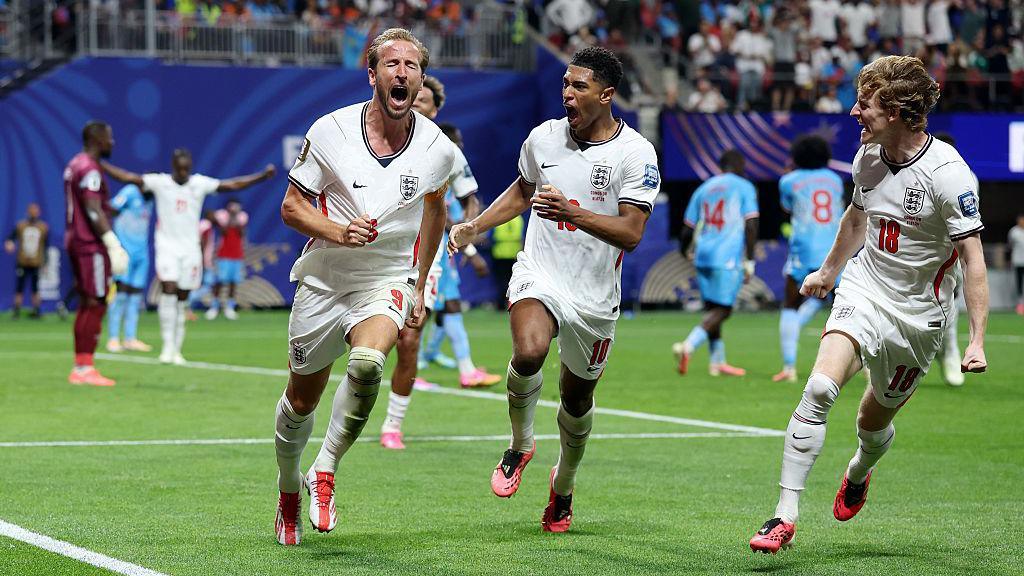 Kane celebrates scoring against DR Congo.