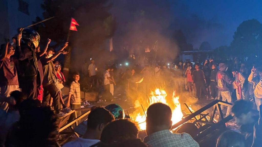 Fire in centre of a crowd of protesters in Nepal.