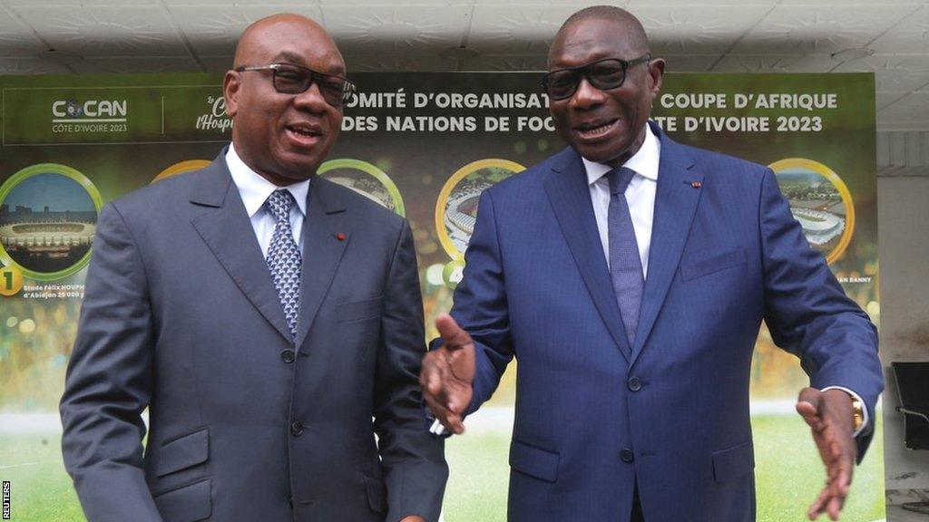 Local football federation president Idriss Diallo (l) and local organising committee chairman Francois Amichia (r)