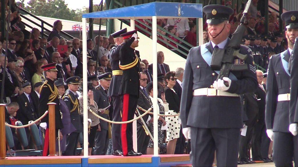 Prince Harry takes a salute at RAF Honington