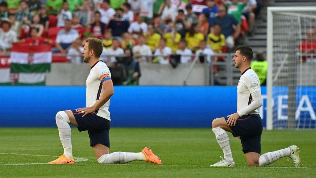 England players take the knee