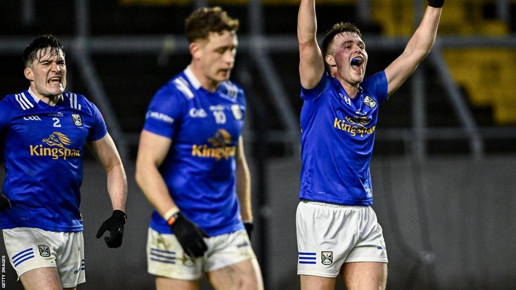 Cavan players celebrate at full-time