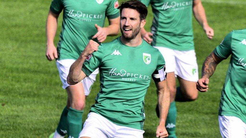 Ross Allen celebrates scoring a goal