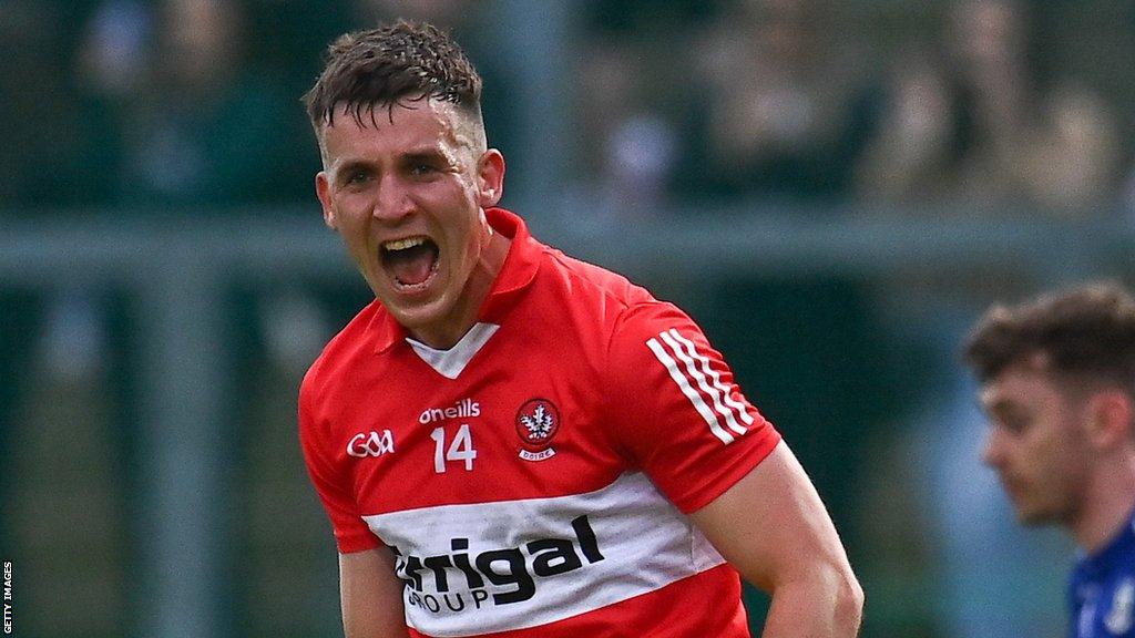 Shane McGuigan celebrates a late point against Monaghan