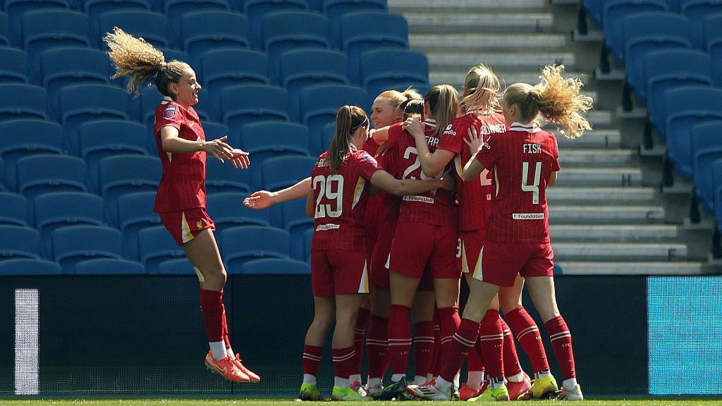 Liverpool celebrate Olivia Smith's opener at Brighton.