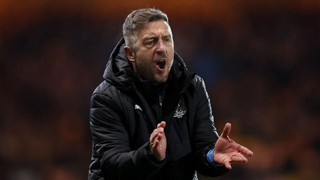 Port Vale manager Jon Brady on the sidelines during the FA Cup third round win over Fleetwood Town