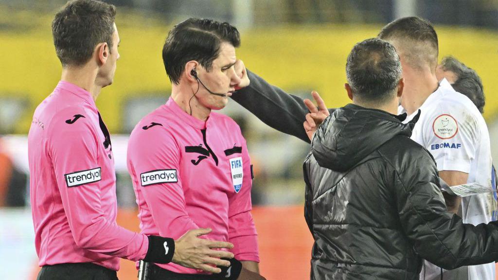 Faruk Koca, president of MKE Ankaragucu (out of sight) throws a punch at referee Halil Umut Meler in December 2023