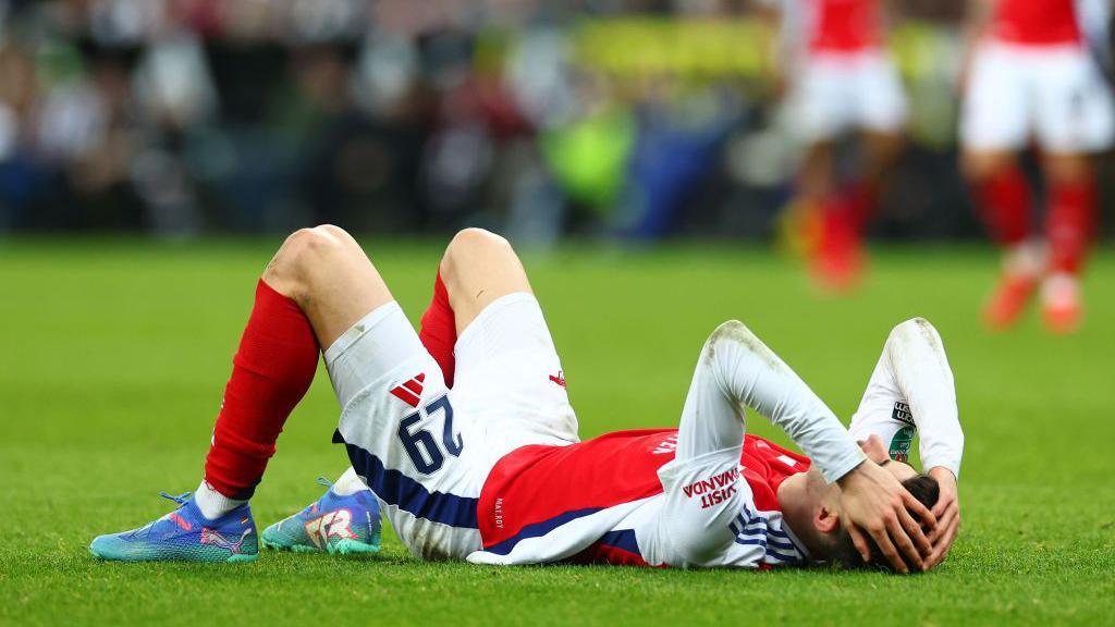 Kai Havertz lies on the pitch during Arsenal's game with Newcastle 