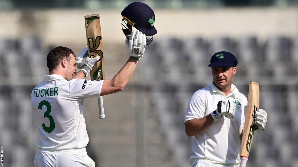 Lorcan Tucker celebrates bringing up his century against Bangladesh