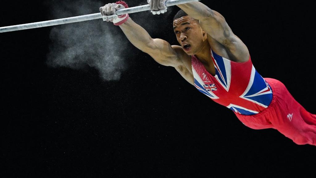 Joe Fraser competing in the men's team final at the World Gymnastics Championships